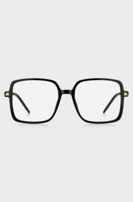 Black-acetate optical frames with gold-tone temples, Black