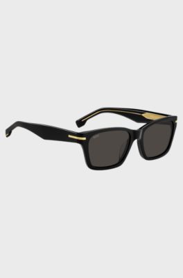 Occhiali da sole in acetato nero con cerniere color oro, Nero