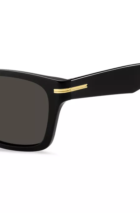 Black-acetate sunglasses with gold-tone hinges