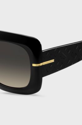 Black-acetate sunglasses with monogram temples, Black