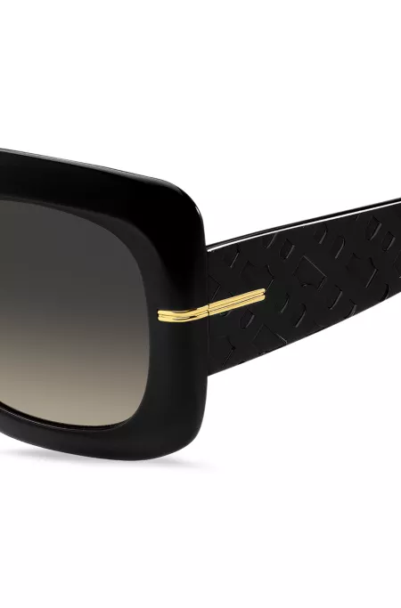 Black-acetate sunglasses with monogram temples