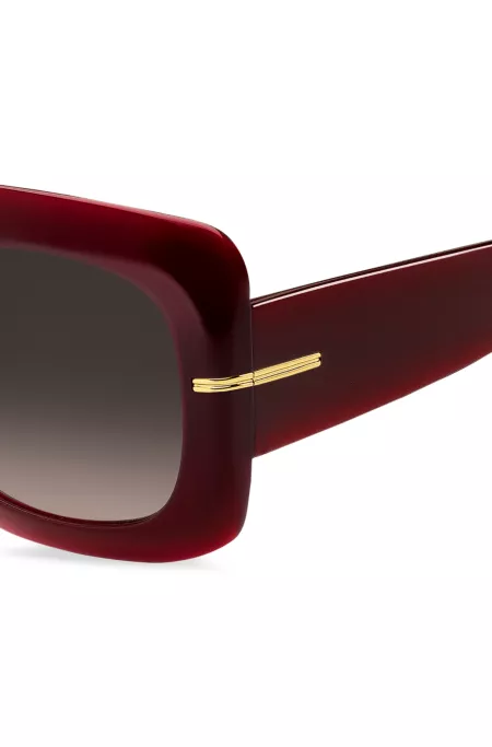 Burgundy-acetate sunglasses with gold-tone hinges