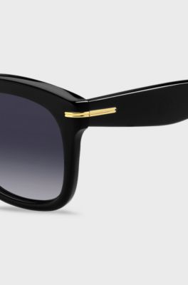 Black-acetate sunglasses with gold-tone hinges, Black
