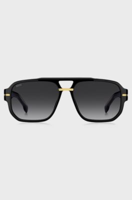 Black-acetate sunglasses with gold-tone details , Black