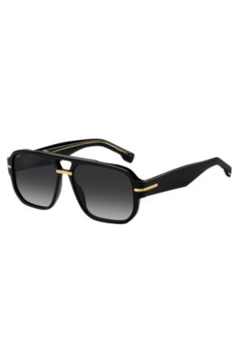 Black-acetate sunglasses with gold-tone details , Black