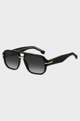 Sonnenbrille aus schwarzem Acetat mit goldfarbenen Details , Schwarz