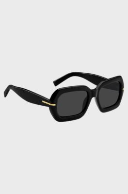 Sonnenbrille aus schwarzem Acetat mit goldfarbenen Scharnieren, Schwarz