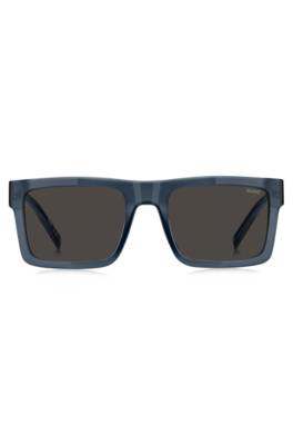Transparent-blue sunglasses with grey lenses