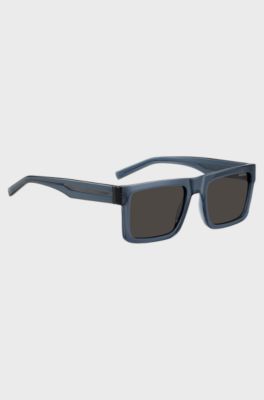 Occhiali da sole blu trasparente con lenti grigie, Blu
