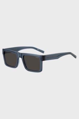 Transparent-blaue Sonnenbrille mit grauen Gl&auml;sern, Blau