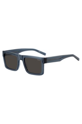 Transparent-blue sunglasses with grey lenses