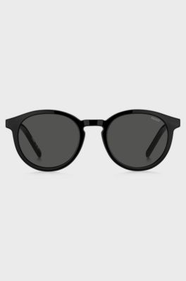 Black optical frames with clip-on shaded lenses, Black