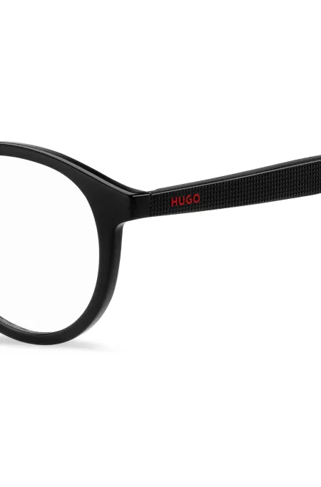 Black optical frames with clip-on shaded lenses
