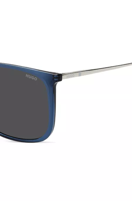 Blue sunglasses with logo details