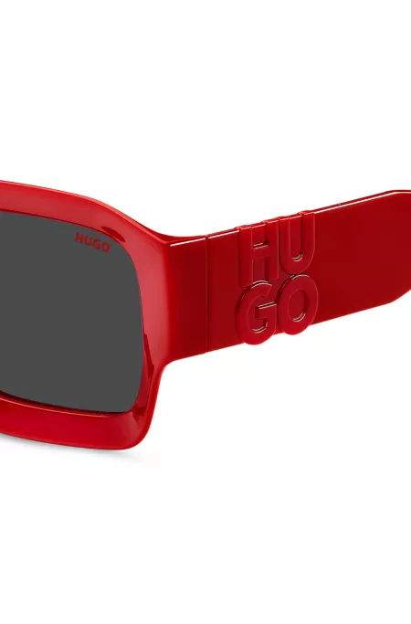 Red sunglasses with stacked-logo temples