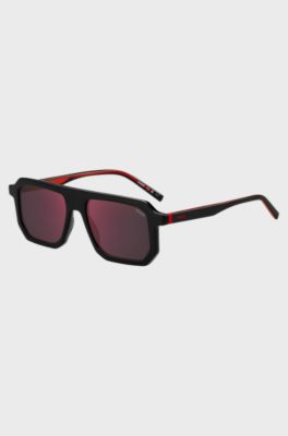 Black sunglasses with signature red accents, Black