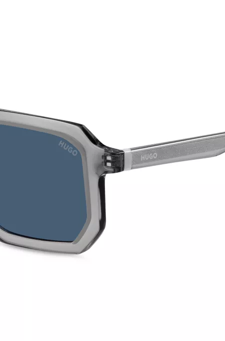 Transparent-grey sunglasses with blue lenses