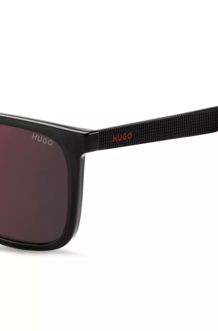Grey sunglasses with textured temples