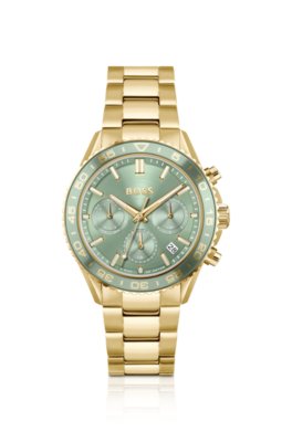 Montre dorée à cadran vert