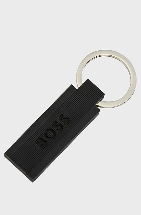 Logo key ring in black silicone and brass, Black
