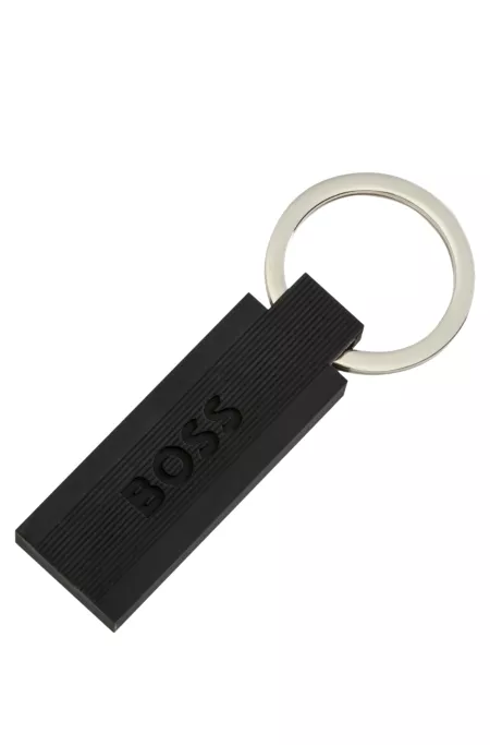 Logo key ring in black silicone and brass