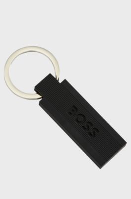 Logo key ring in black silicone and brass, Black