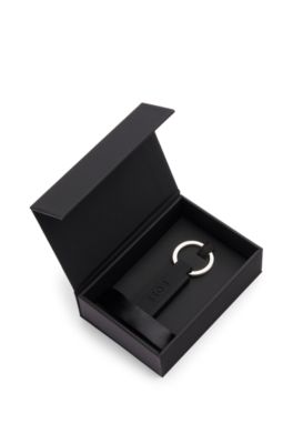 Logo key ring in black silicone and brass, Black