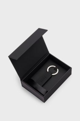 Logo key ring in black silicone and brass, Black