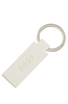 Schl&uuml;sselanh&auml;nger aus Silikon und Messing mit Logo, Wei&szlig;