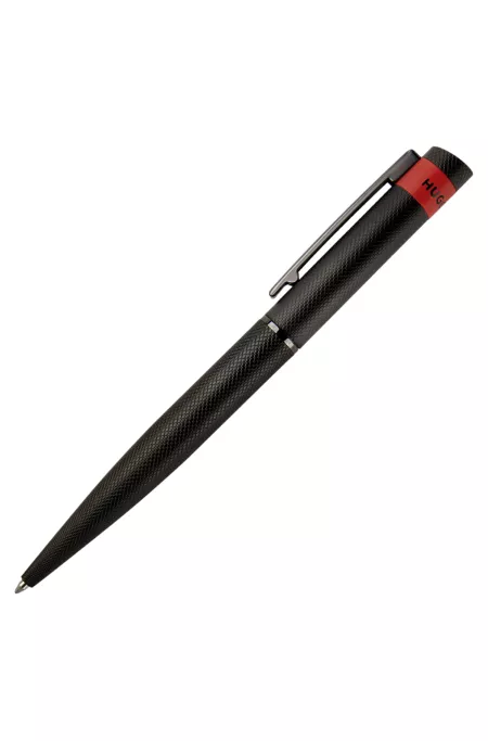 Black ballpoint pen with matte diamond-cut pattern