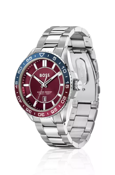 Silver-tone watch with red dial and rotating bezel