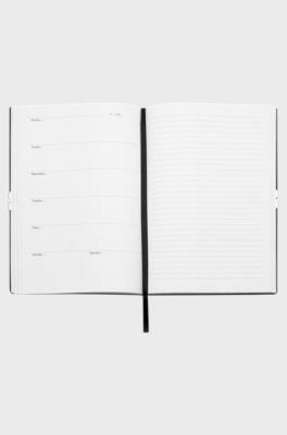 Carnet&nbsp;A5 en similicuir noir avec &eacute;lastique &agrave; rayures embl&eacute;matiques, Noir