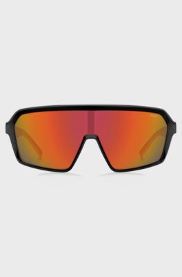 Mask-style sunglasses with red shaded lenses, Black