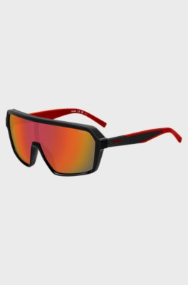 Mask-style sunglasses with red shaded lenses, Black