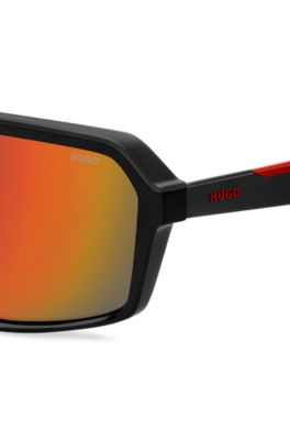 Mask-style sunglasses with red shaded lenses, Black