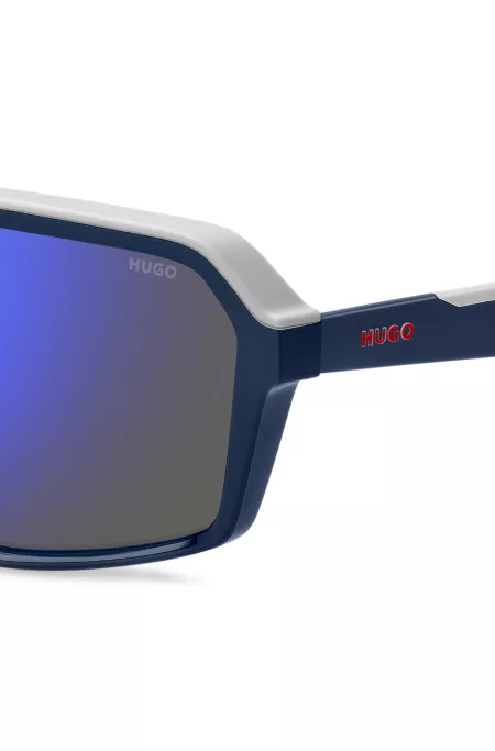 Mask-style sunglasses with blue shaded lenses