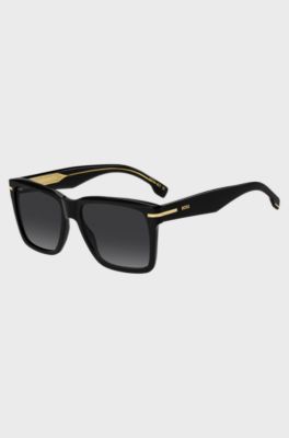 Occhiali da sole in acetato nero con rifiniture color oro, Nero