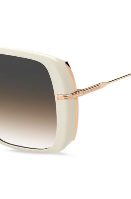 Gelaagde zonnebril van cr&egrave;mekleurig acetaat met ros&eacute;goudkleurige pootjes, Wit