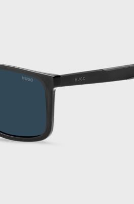 Black sunglasses with blue shaded lenses, Black