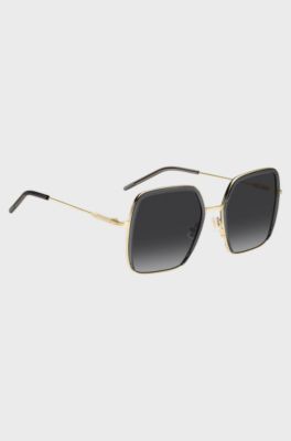 Sonnenbrille aus grauem Acetat und goldfarbenem Edelstahl, Grau