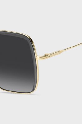 Sonnenbrille aus grauem Acetat und goldfarbenem Edelstahl, Grau
