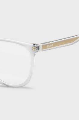 Clear-acetate optical frames with gold-tone core wire, Transparent