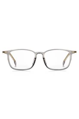 Optical frames in transparent acetate and gold-tone steel