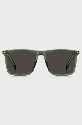 Gafas de sol de acetato verde con ribetes en tono dorado, Verde