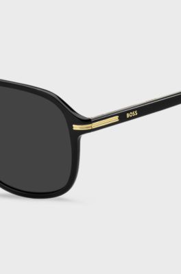 Black-acetate sunglasses with gold-tone trims, Black