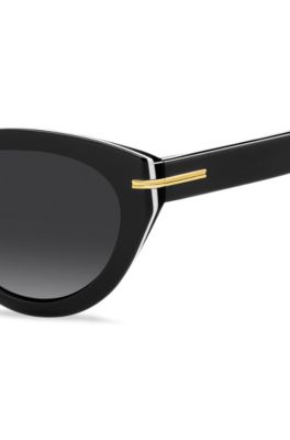 Sonnenbrille aus schwarzem Acetat mit goldfarbenen Details, Schwarz