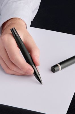 Textured-barrel rollerball pen with signature-stripe ring, Black
