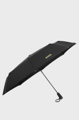 Monogram-canopy pocket umbrella in black and gold, Black