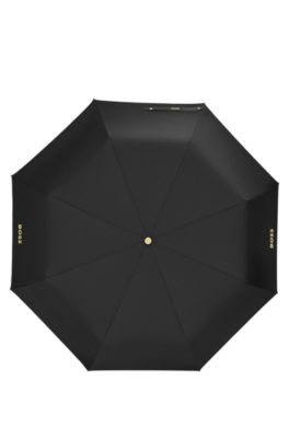 Monogram-canopy pocket umbrella in black and gold, Black