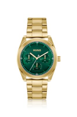 Gold-tone watch with green dial
